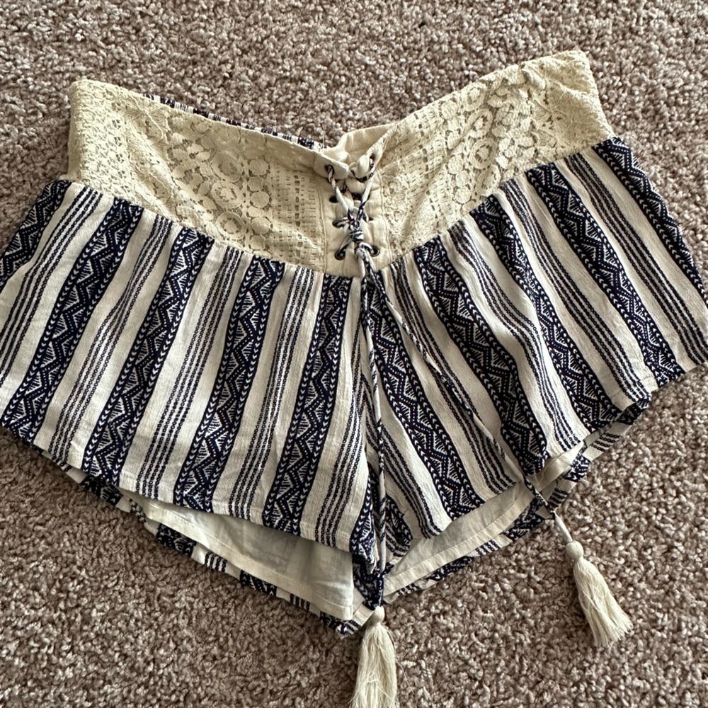 Rip Curl striped lace front shorts with tassel detail